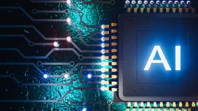 Puce électronique avec linscription AI illuminée représentant lintelligence artificielle et lEdge Computing